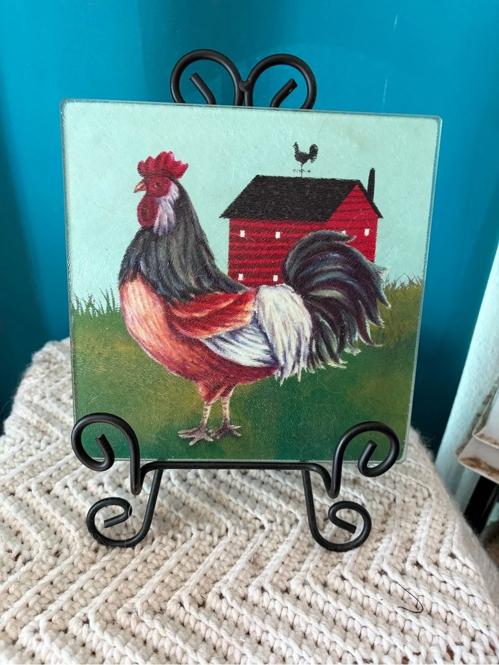 Square tempered glass cutting board with rooster and barn motif